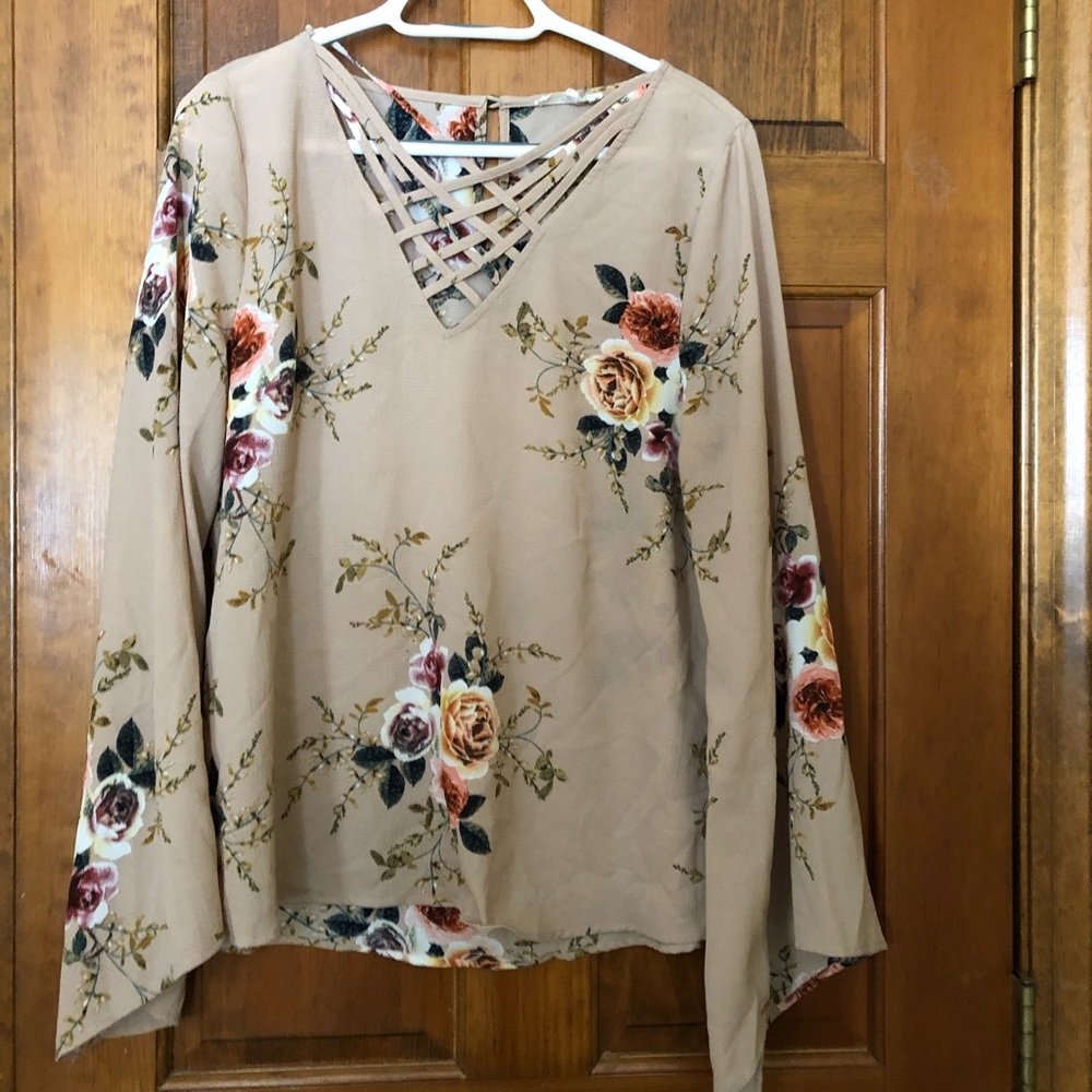 Boho style beige floral blouse with bell sleeves
